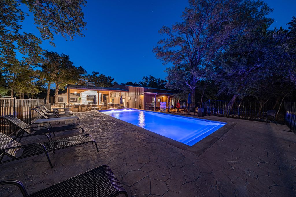 A peaceful view of vacation rentals in Wimberley Texas surrounded by nature, showcasing a relaxing hill country environment perfect for a weekend or extended getaway.