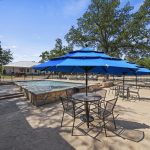 A peaceful view of vacation rentals in Wimberley Texas surrounded by nature, showcasing a relaxing hill country environment perfect for a weekend or extended getaway.