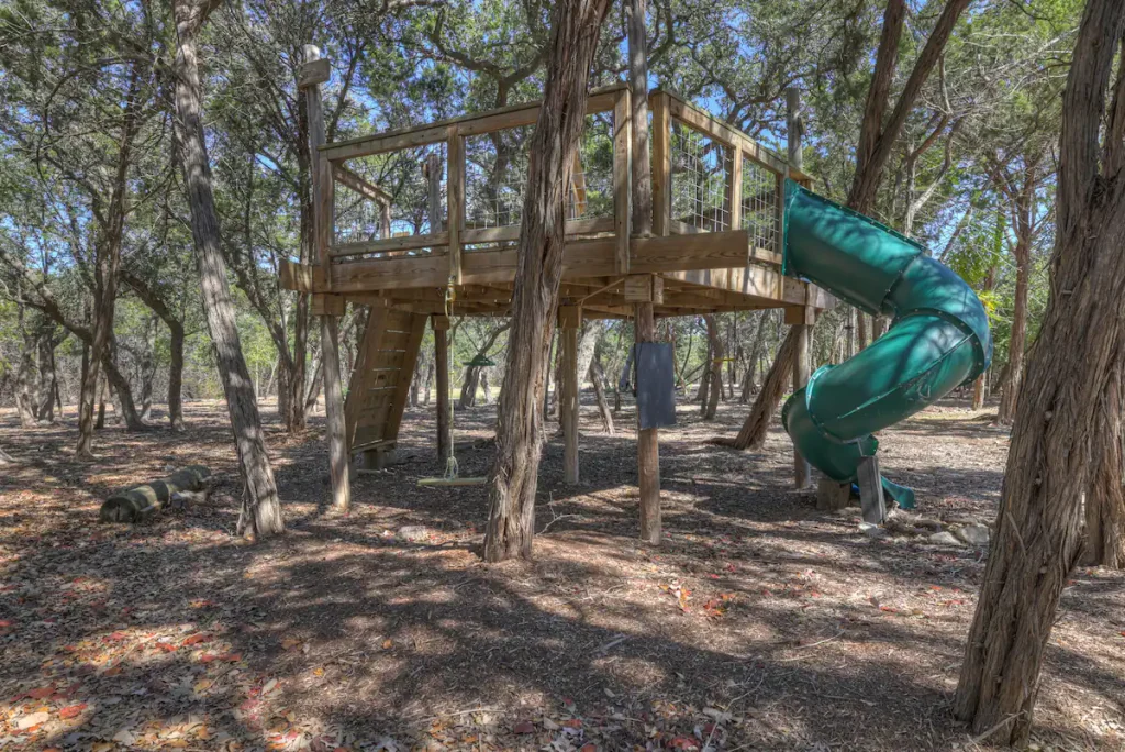 A peaceful view of vacation rentals in Wimberley Texas surrounded by nature, showcasing a relaxing hill country environment perfect for a weekend or extended getaway.