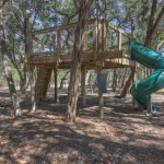 A peaceful view of vacation rentals in Wimberley Texas surrounded by nature, showcasing a relaxing hill country environment perfect for a weekend or extended getaway.