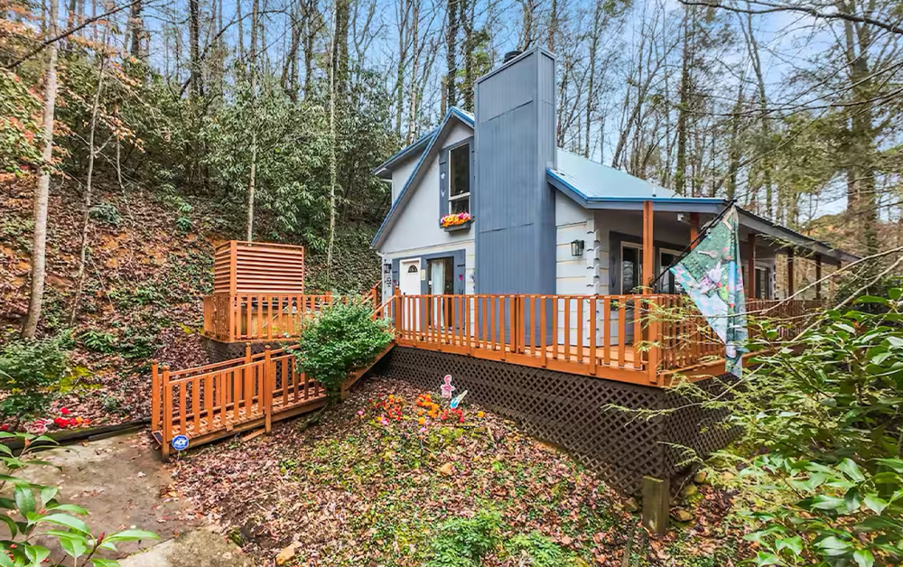 Festive nighttime scene of a major attraction in the Smoky Mountains, featuring the iconic Ferris wheel, perfect for a New Year celebration.