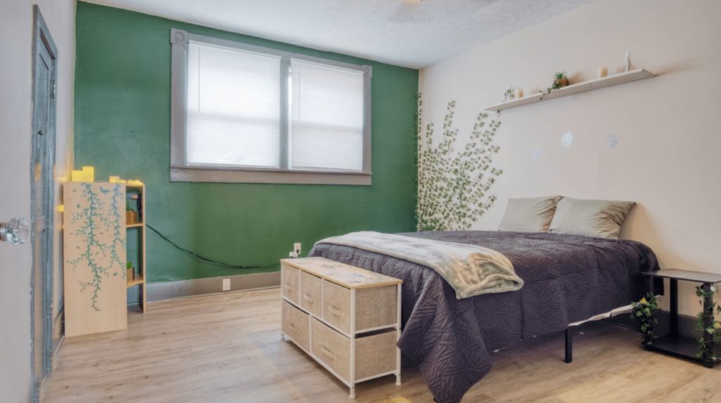 Monument Circle twilight view in downtown Indianapolis with Soldiers and Sailors Monument, vibrant city lights, and nearby short term rentals Indianapolis like Indy Nook Ave Unit